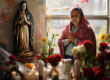 Chicano community altar with candles, Virgin of Guadalupe, and cultural symbols