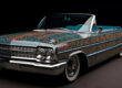 custom lowrider with murals representing Chicano heritage