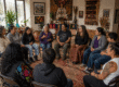 Community healing circles bringing Chicano families together in a shared cultural space